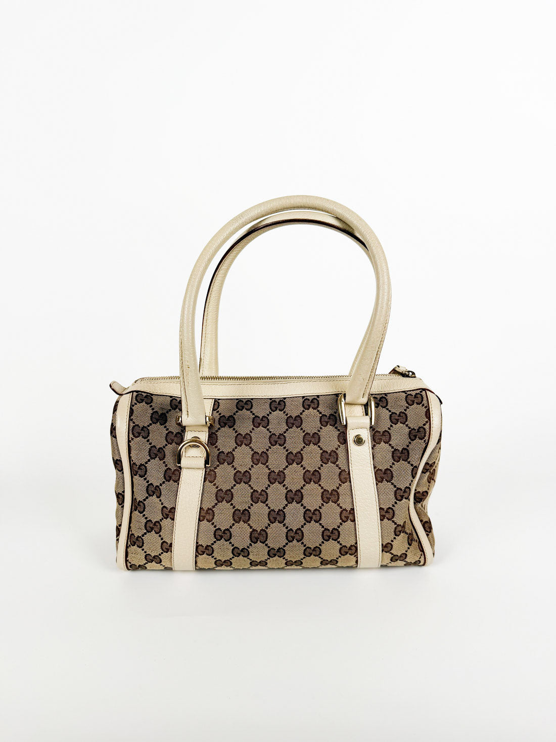 Designer handbag with gucci monogram pattern 